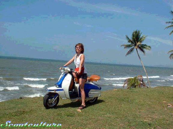 A scooter is at home in beautiful places