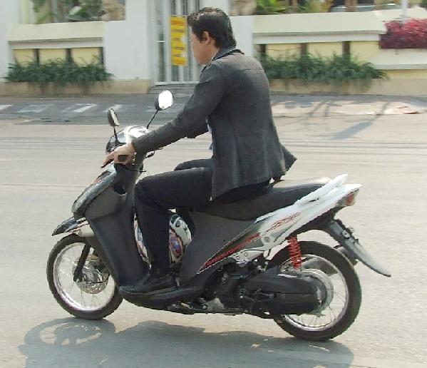 Where scooters dominate, scooting in a suit is perfectly suitable.